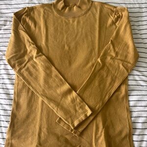 Woman’s Mustard Turtleneck